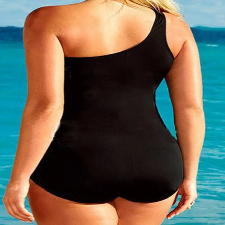 Women's solid black one-piece swimsuit with chest pad, available in XL, 2XL, and 3XL plus sizes.