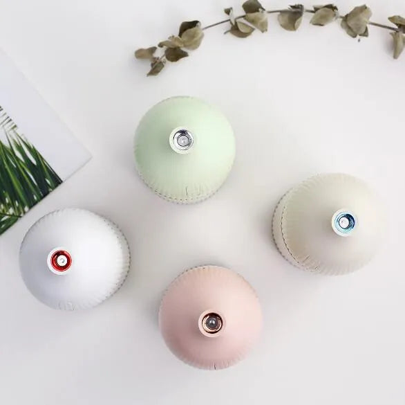 White 300ml USB ultrasonic aromatherapy diffuser with LED light measuring 80x80x155mm