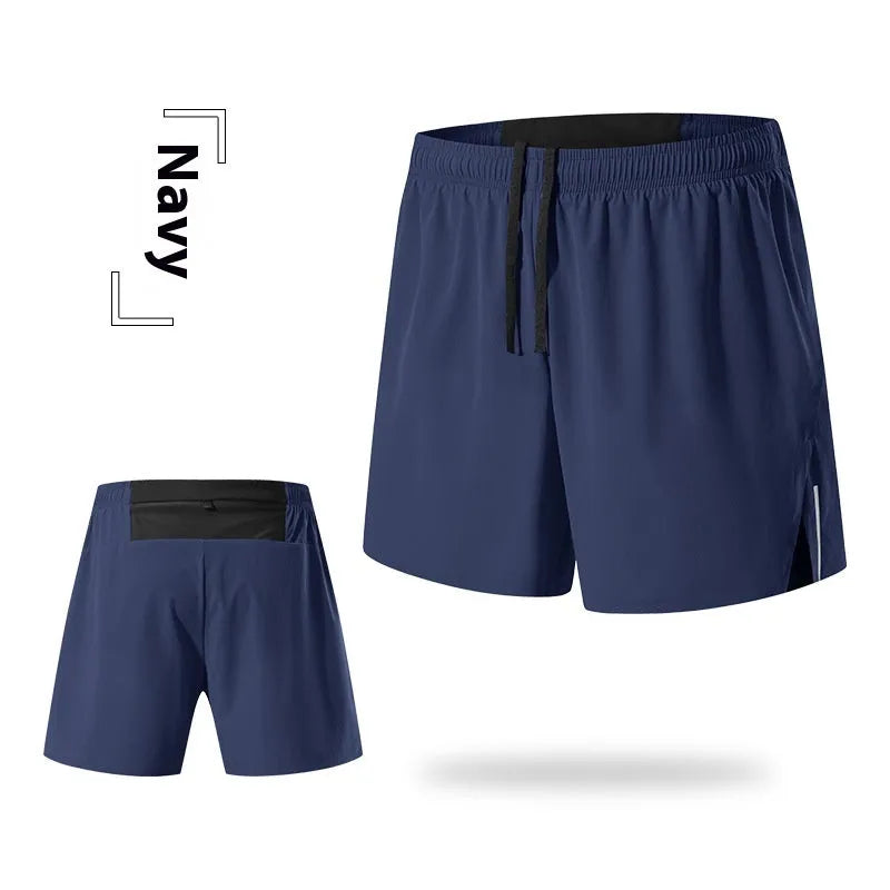 Man wearing high-waisted grey off-road running shorts for cross-country running.