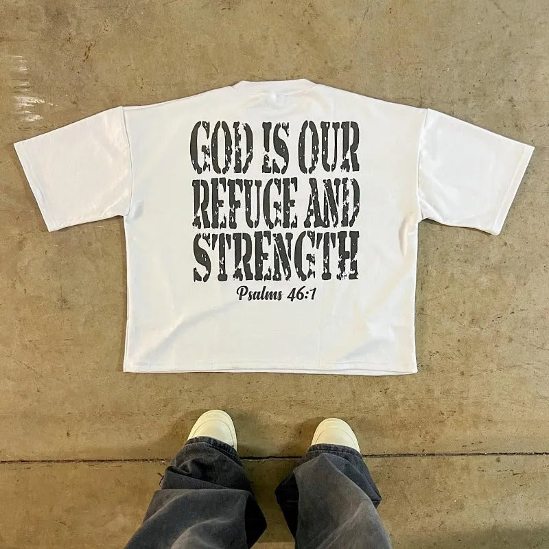 A printed cotton short-sleeve T-shirt with a retro street style graphic, shown in a contrast colour with a drop-shoulder fit.