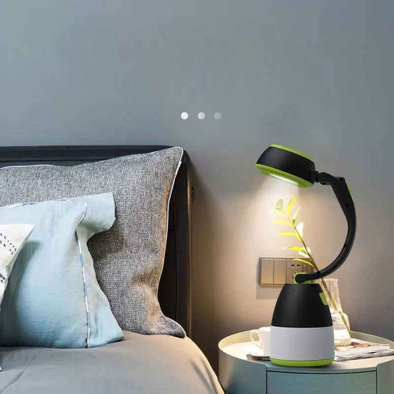 Black green multifunctional LED camping lamp with adjustable head, shown with USB cable.