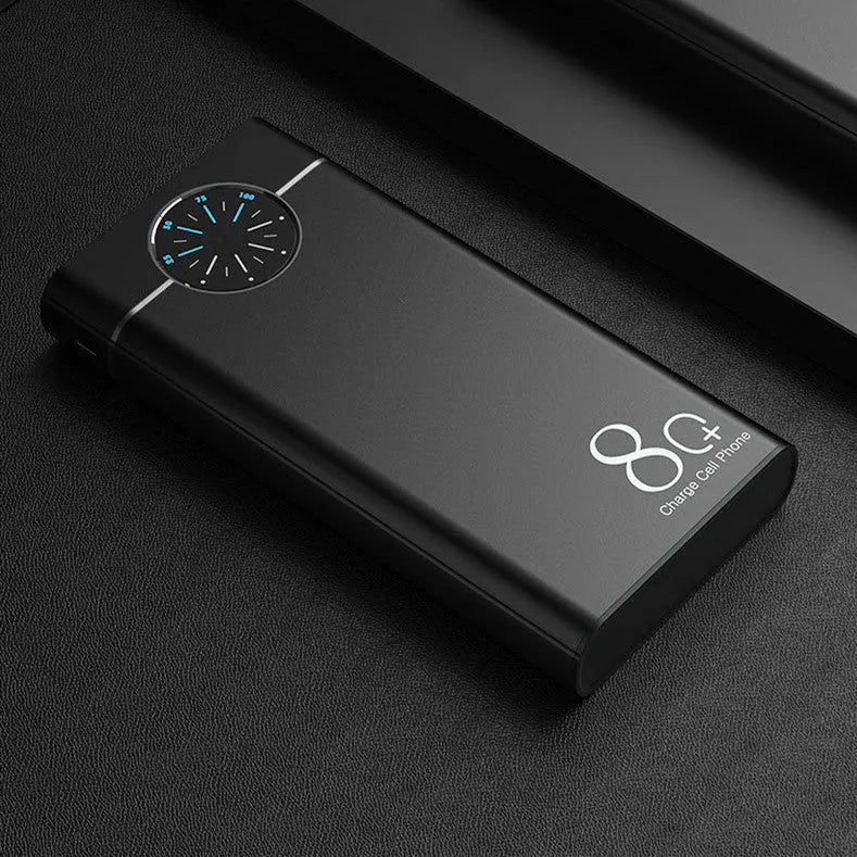 Black alloy fast charging power bank showing front with USB ports and LED flashlight.
