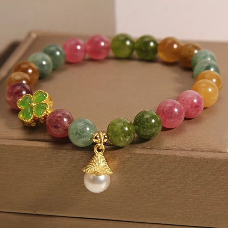 Colourful tourmaline bracelet with four-leaf clover pearl pendant in geometric drop shape