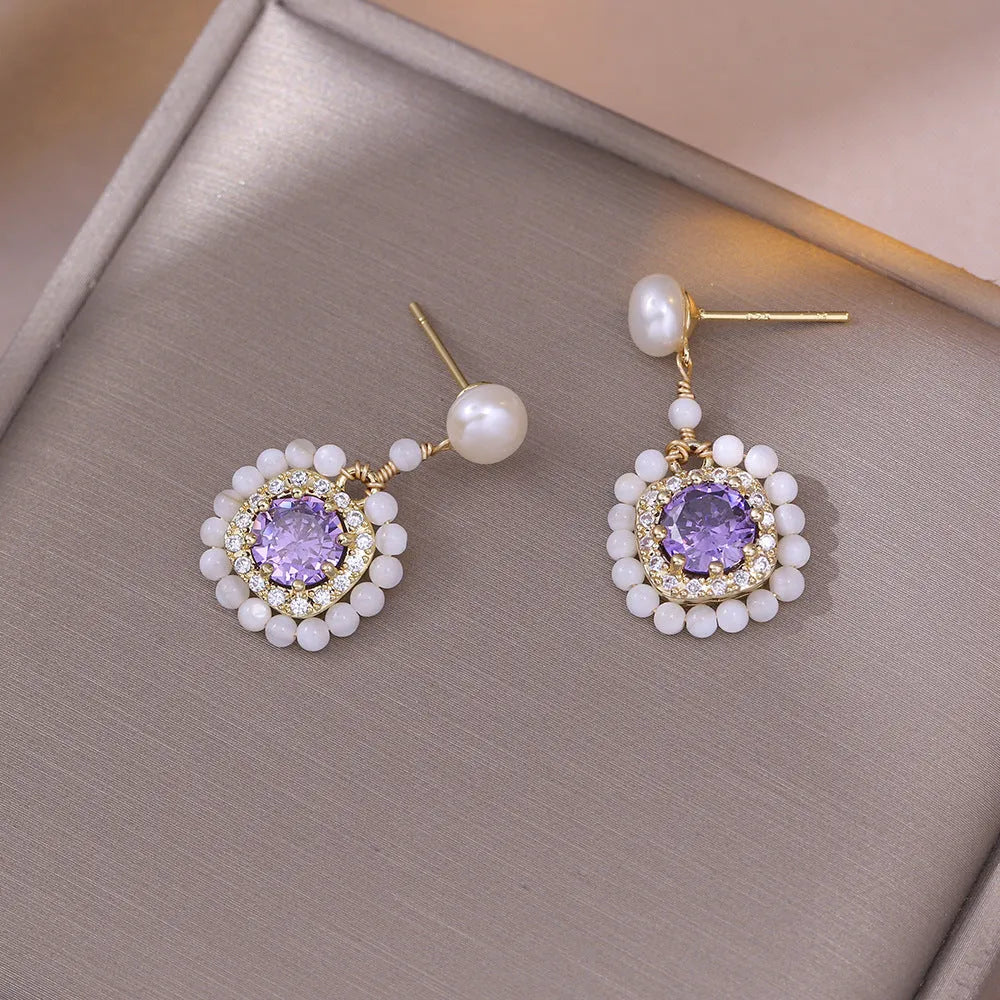 Natural freshwater pearl flower-shaped earrings in purple with diamond treatment finish