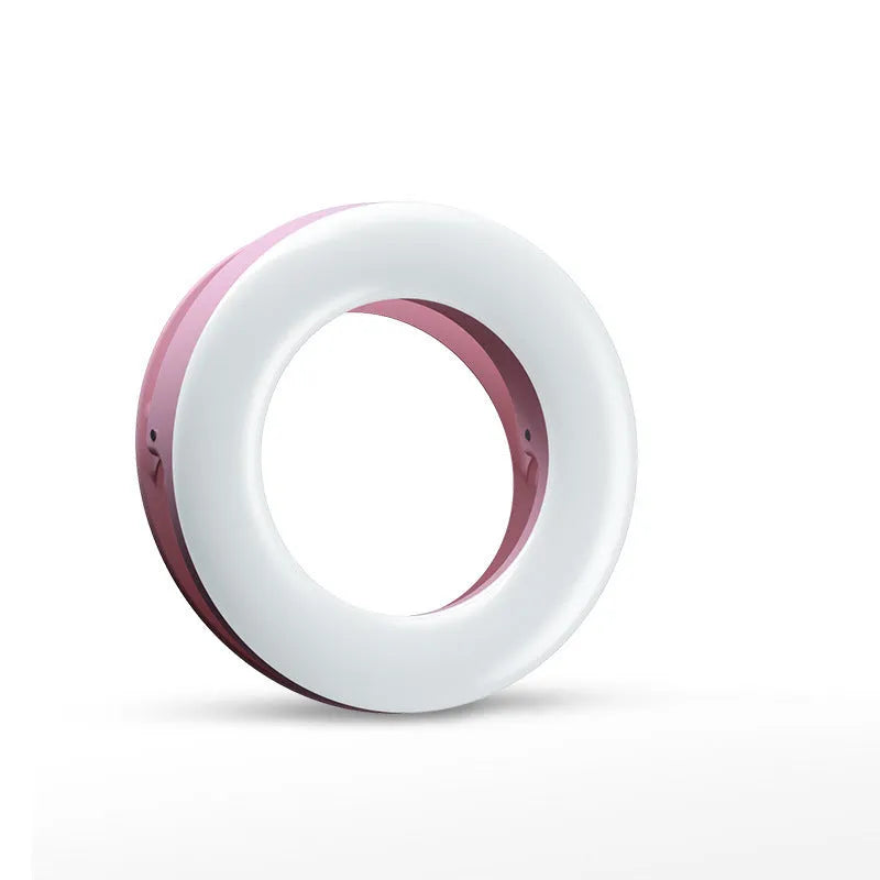 Black portable LED ring light for mobile phone photography with USB cable.