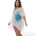 White plus size beach cover-up blouse for women, loose polyester fabric for swimming and sun protection.