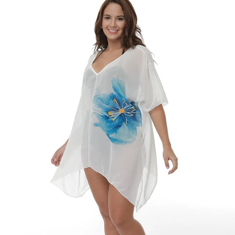 White plus size beach cover-up blouse for women, loose polyester fabric for swimming and sun protection.