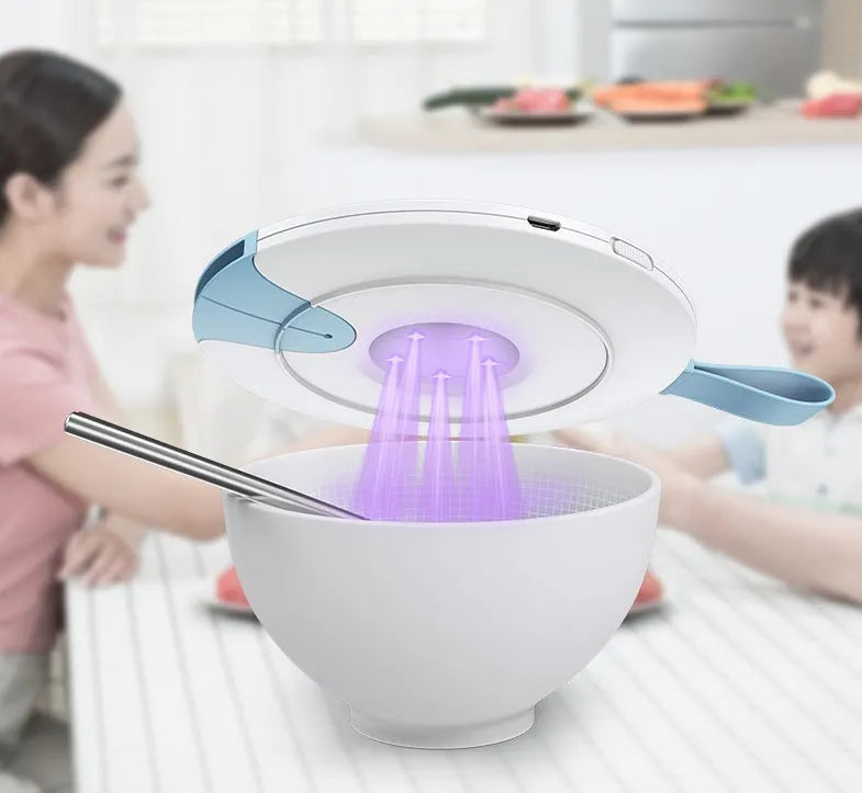 Compact blue or pink portable UV baby bottle sterilizer showing USB port and dimensions.