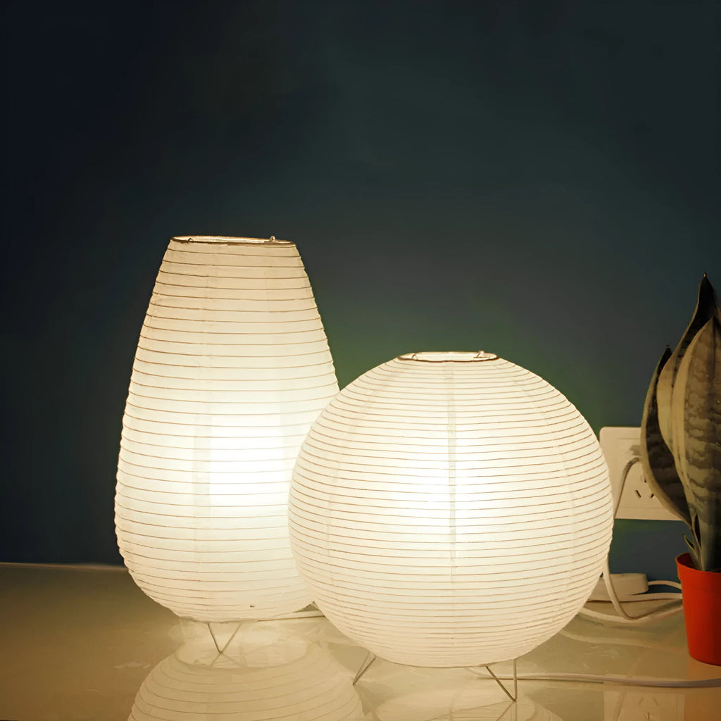 Traditional handmade rice paper table lamp with E14 bulb fitting on bedside table