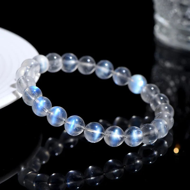 Natural cream body crystal bracelet with blue moonlight gemstone in simple unisex design