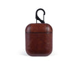 Genuine leather protective case for Apple AirPods in black, brown, light brown, and red.