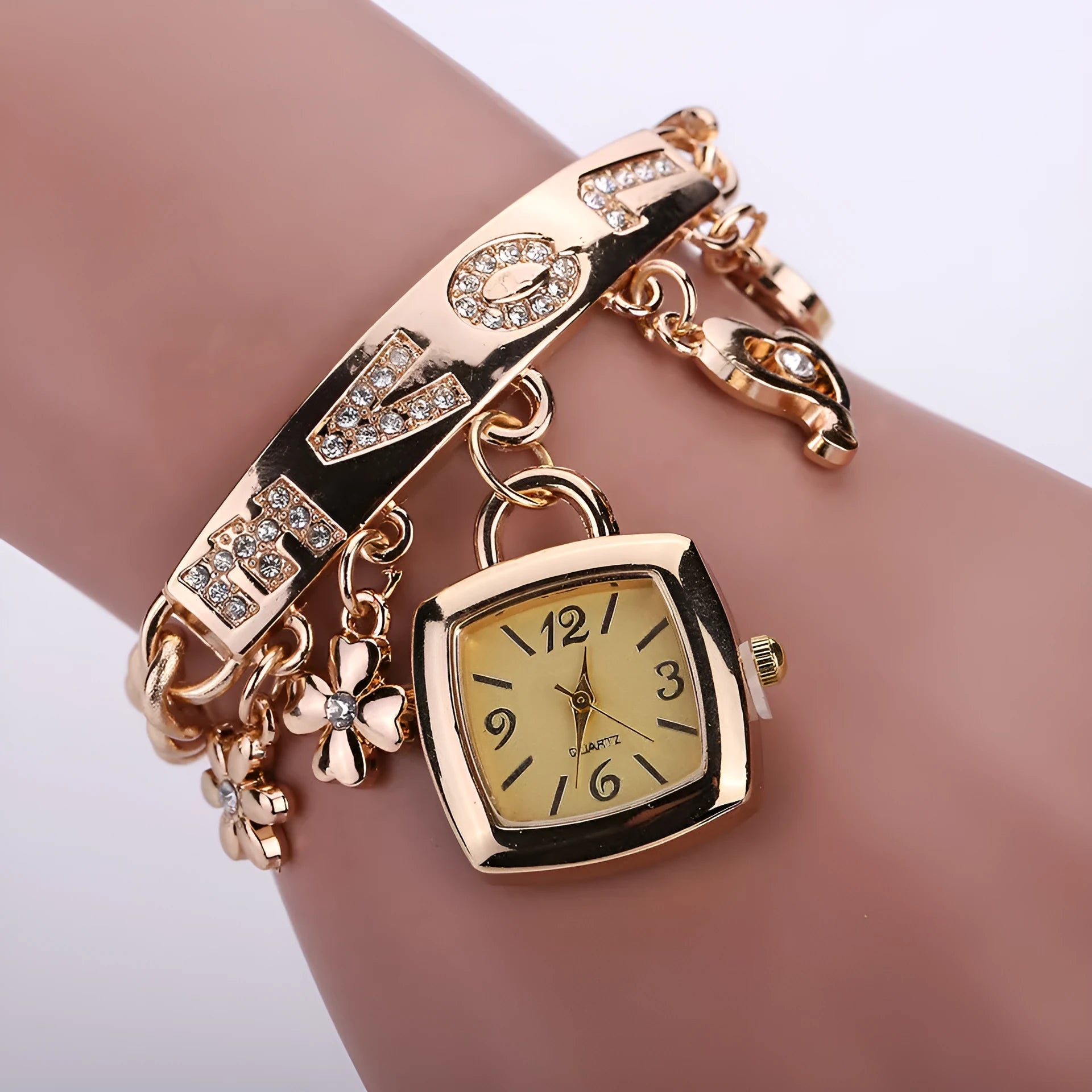 Women's alloy bracelet watch with square 22mm gold dial, alloy strap, and stainless steel pin buckle