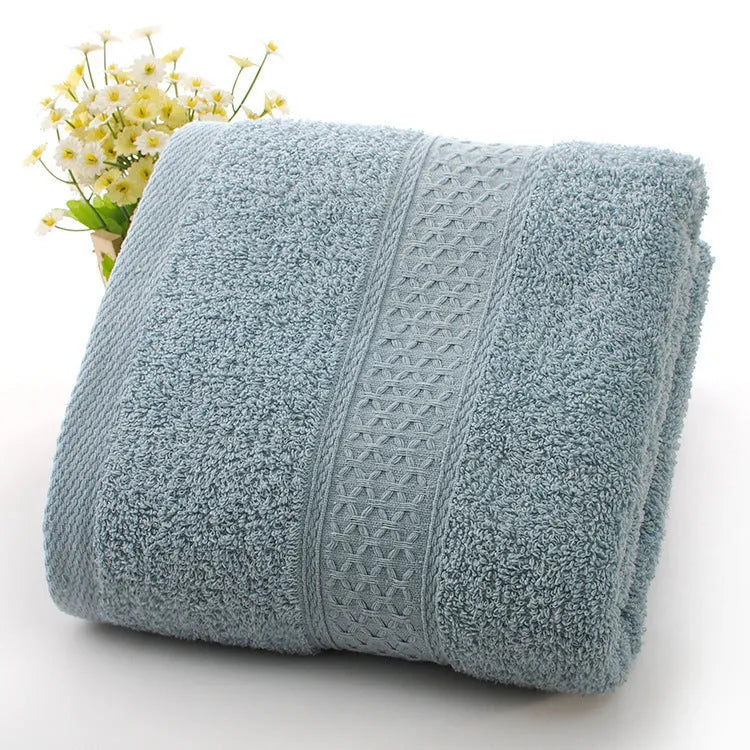 Thickened cotton blend bath and beach towel shown in one of its available colours like apple green or dark blue