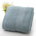 Thickened cotton blend bath and beach towel shown in one of its available colours like apple green or dark blue
