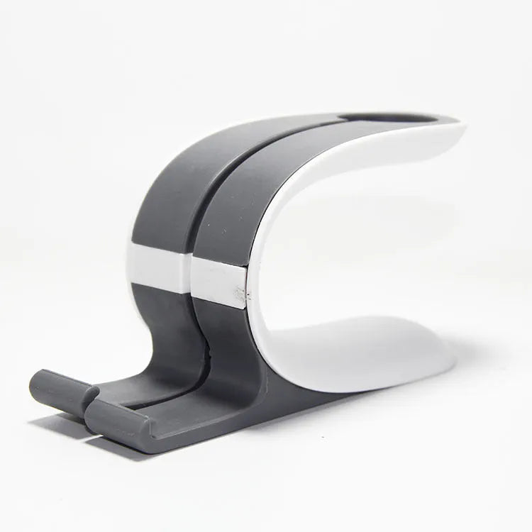 Grey desktop charging stand holding Apple iPhone and Apple Watch for simultaneous charging