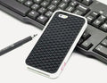 Waffle sole silicone phone case for iPhone 6s with checker pattern texture in black edge on brown background