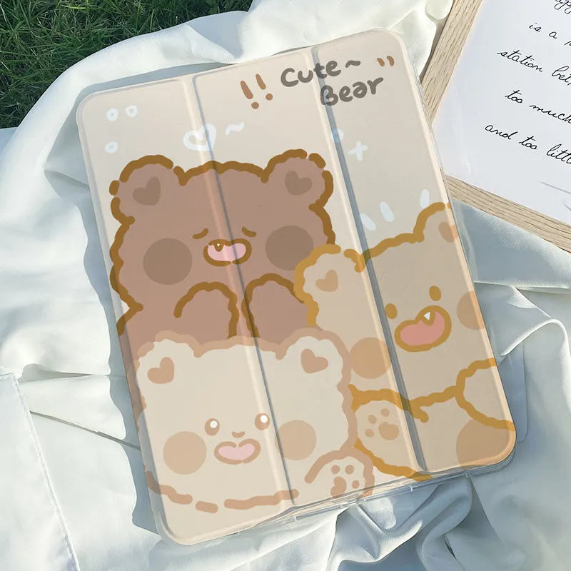 Flat tri-fold silicone iPad case with rabbit cartoon design on a table.