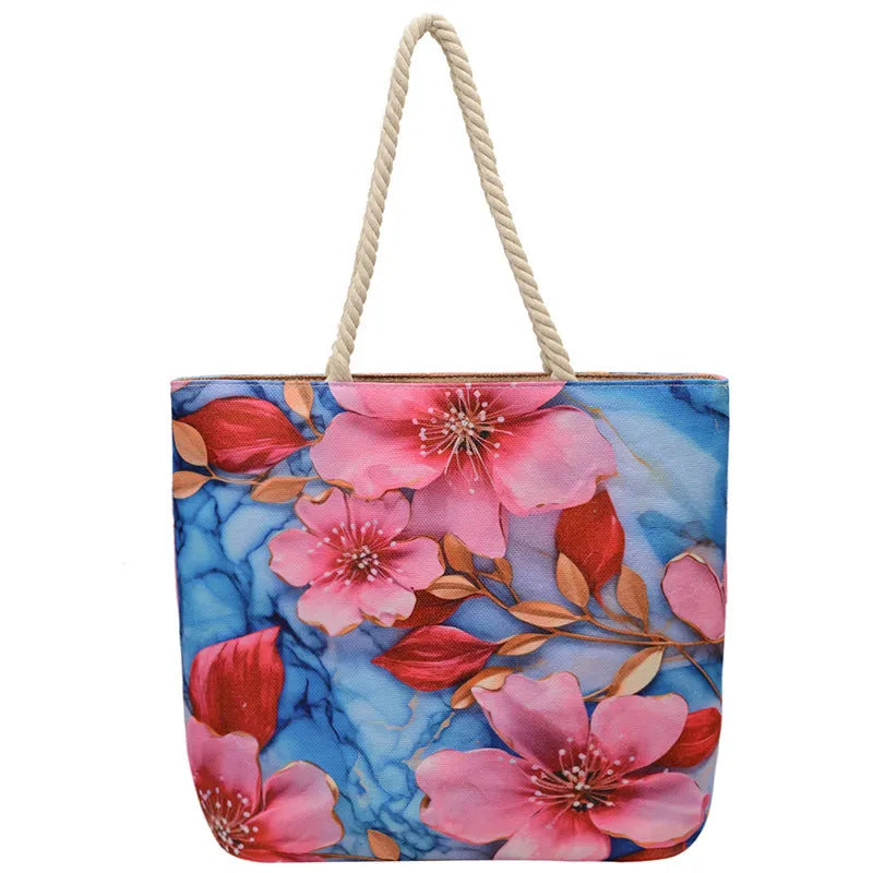 A soft cotton and linen string shoulder handbag with two straps and an open outer pocket.