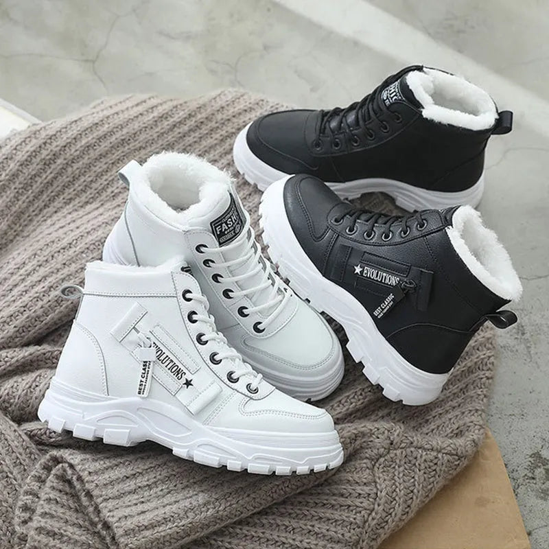 Fleece lace-up boots in black with high-top design, flat heel, and round toe. Artificial PU upper with short plush lining and waterproof platform.