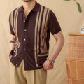 Man's short-sleeved striped polo cardigan with a lapel collar in a light blue colour.