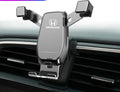 Car phone bracket gravity snap-on mount in Athens Black for dashboard outlet installation