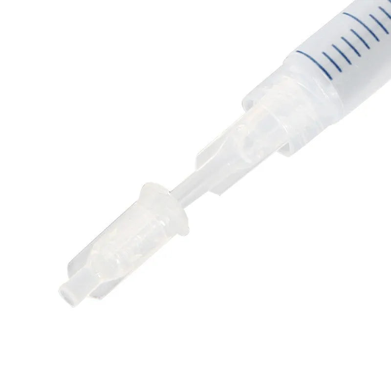 Bright Teeth Whitening Kit with LED cold light device and desensitizing gel syringes on a white background