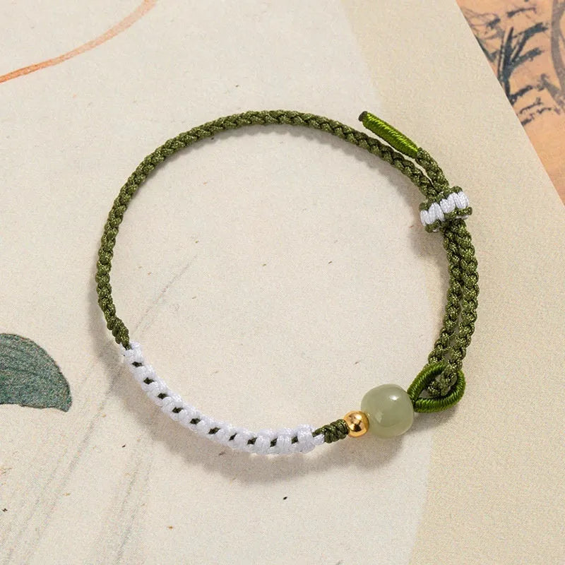 Sterling silver electroplated Hetian jade bracelet on adjustable cord strap