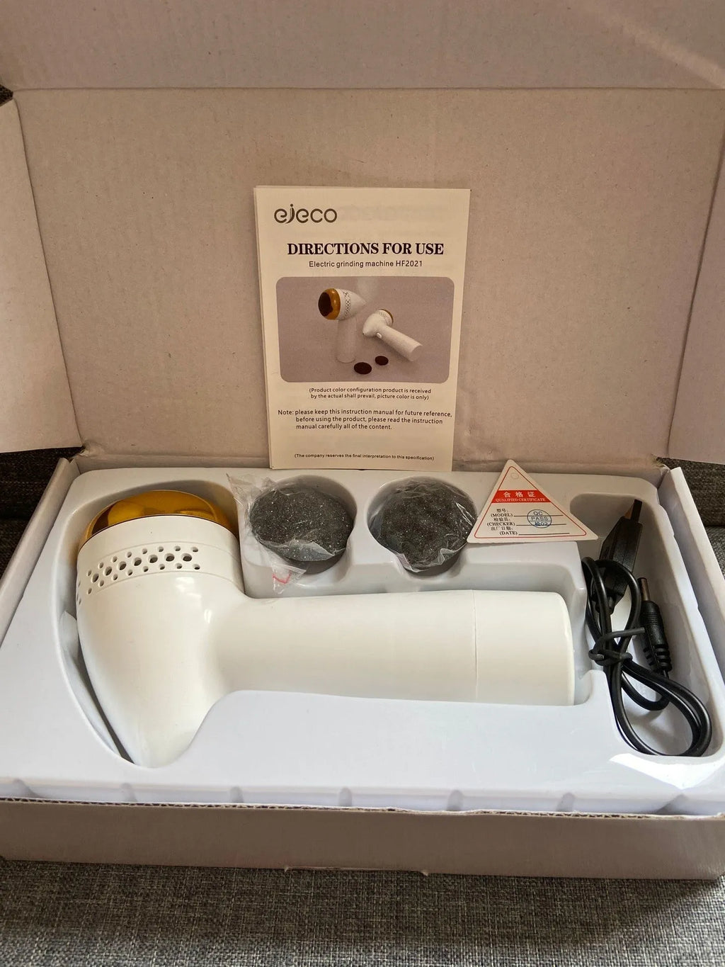 Electric foot grinder with refined quartz grinding head in gold, silver, and pink finish options.