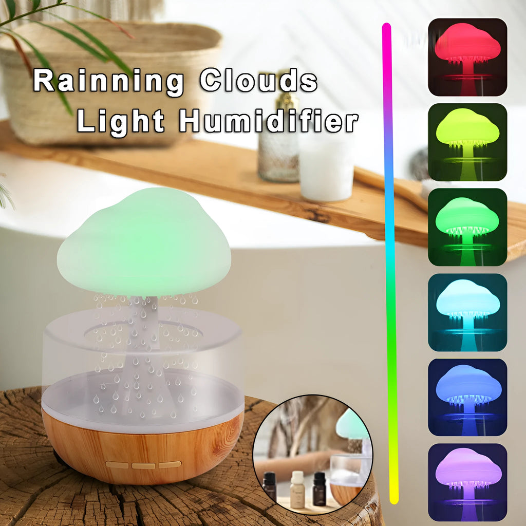 White cloud-shaped aromatherapy humidifier with night lights and USB cable.