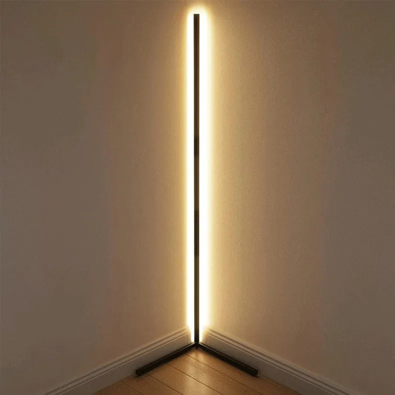 Nordic RGB corner floor lamp with aluminium shade, PVC body, remote control, 1.42m height, black finish against a light wall