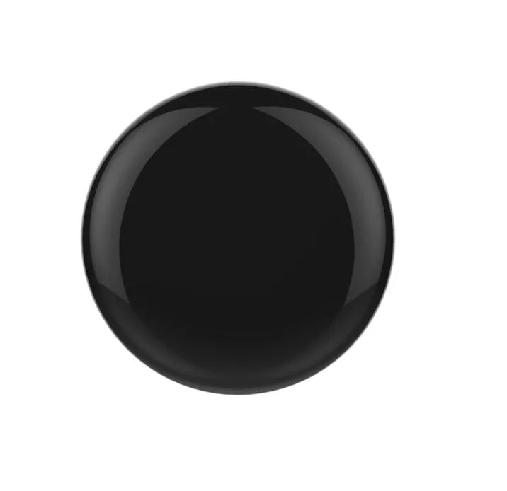 Black compact infrared wifi smart remote control with 360° IR transmission on a table