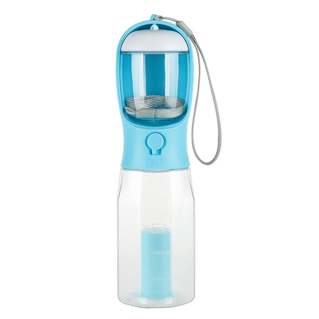 Turquoise portable 3-in-1 dog water bottle with food feeder and built-in poop bag dispenser on a walk