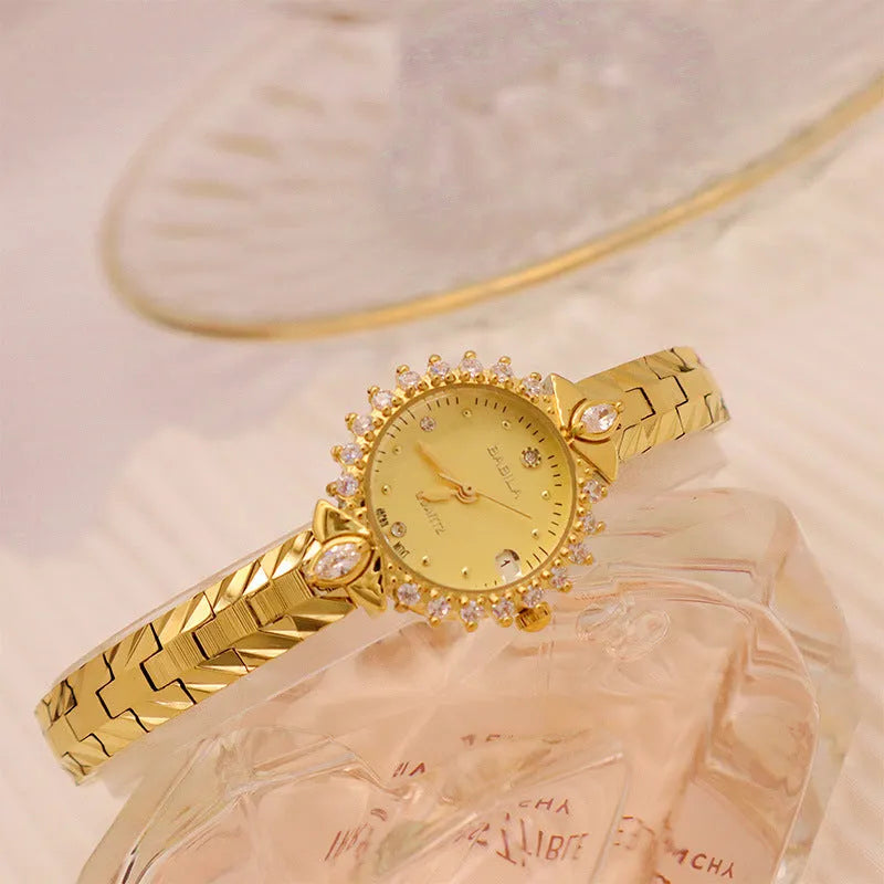 Gold quartz watch with embossed bracelet featuring 5A diamond detailing