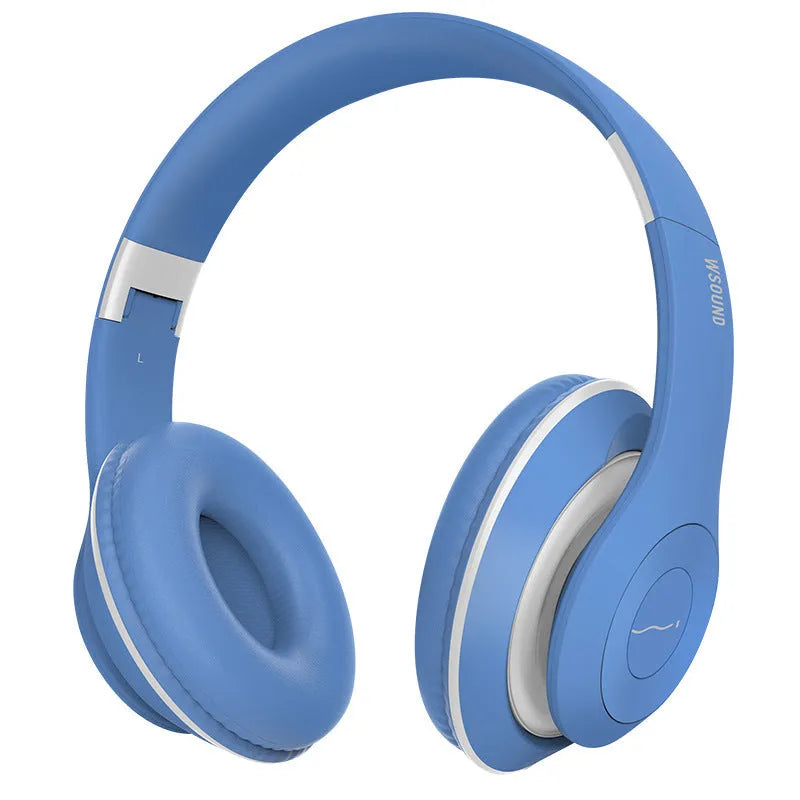 Blue and red Bluetooth wireless stereo headsets on a table.