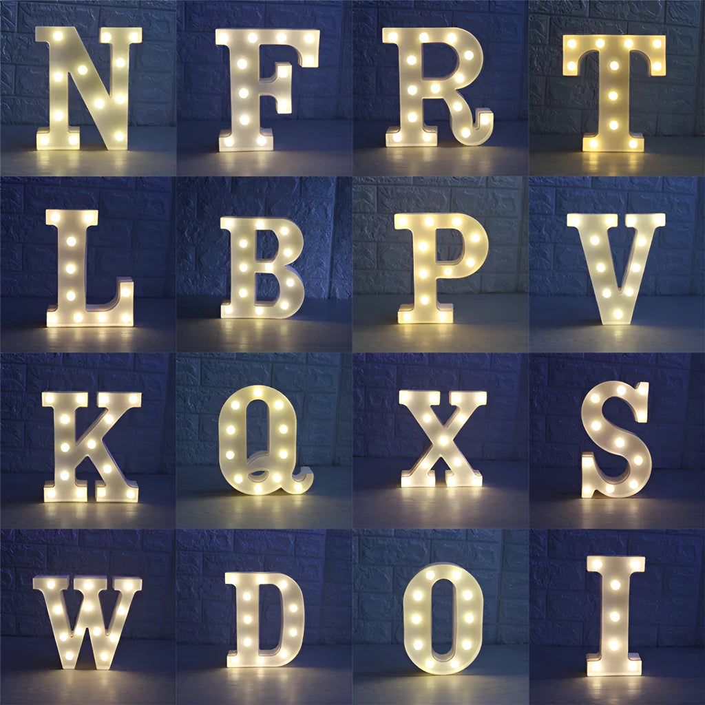 White plastic LED marquee letter sign with warm white glow, 22cm tall