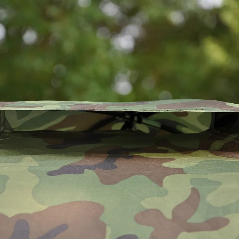 Green camouflage two-person camping tent with fibreglass poles and mesh windows