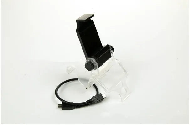 Black PS4 DualShock controller clip holding a mobile phone, with a Micro USB OTG cable for connection.