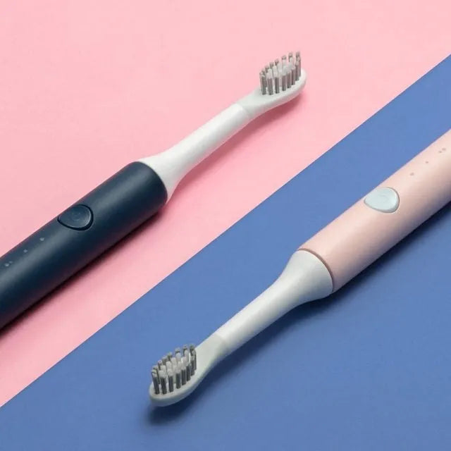 SOOCAS sonic electric toothbrush in blue or pink with round brush head