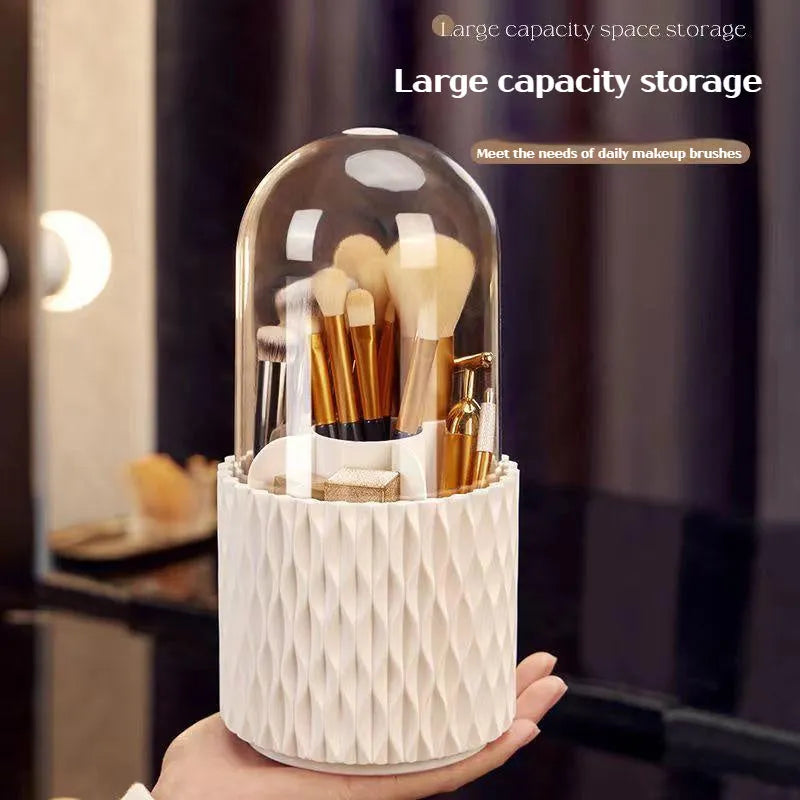 White acrylic rotating makeup brush holder with transparent dust cover showing split storage compartments