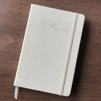 A5 ruled hardback notebook with natural kraft cover, 192 pages, on a wooden table