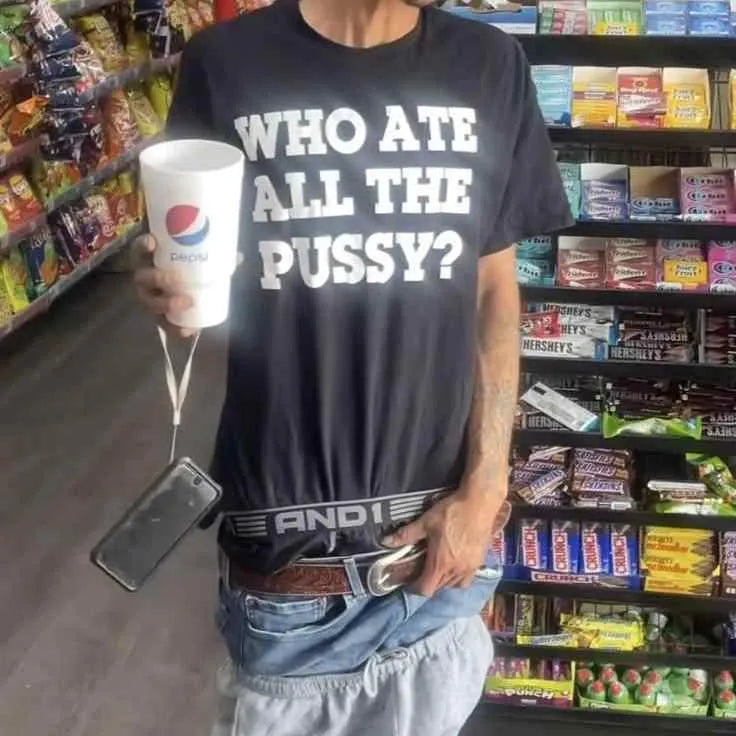 Man wearing a black loose-fit heavyweight cotton retro short-sleeved t-shirt.