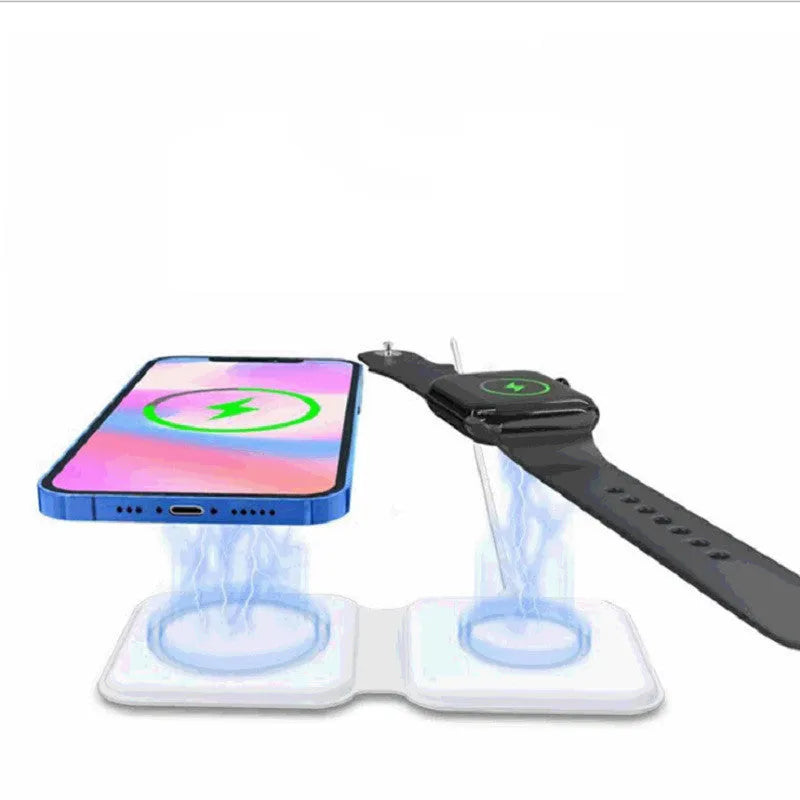 White foldable magnetic wireless charging dock with a phone attached and earbud case on the base.
