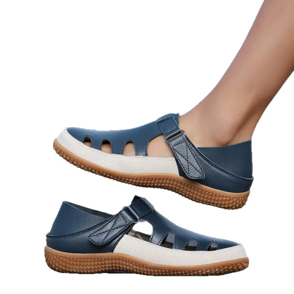 Women's plus size flat heel sandals with hollow breathable design and toe cap in blue colour