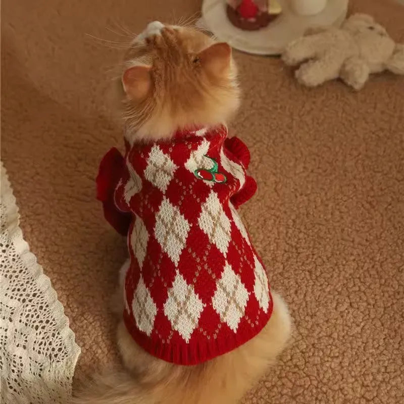 Red cat sweater with rhombus and cherry embroidery, shown in size L on a mannequin.