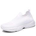 A pair of low-top slip-on sock shoes in a choice of colours, showing the mesh lining and lightweight PVC sole.