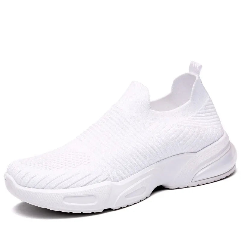A pair of low-top slip-on sock shoes in a choice of colours, showing the mesh lining and lightweight PVC sole.