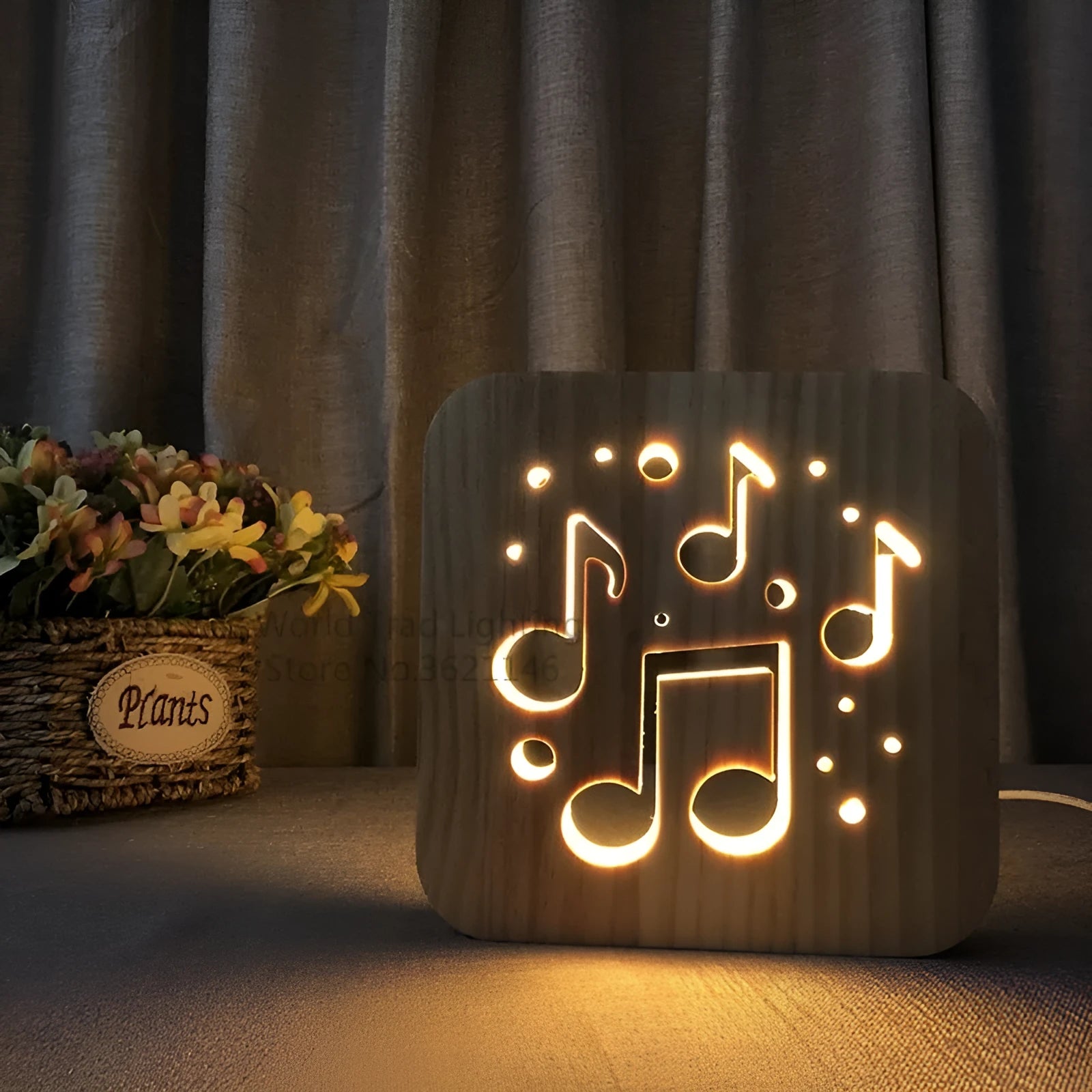 Square pine wood USB LED lamp with warm white light on a wooden desk next to a laptop.
