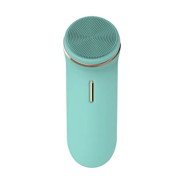 Silicone electric face cleaner in green, compact size 132x50x38mm, with USB charging cable