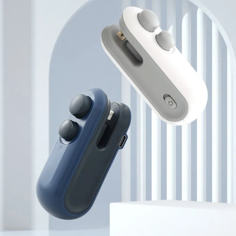 Blue and white handheld USB rechargeable heat sealer with built-in cutter for sealing food bags.