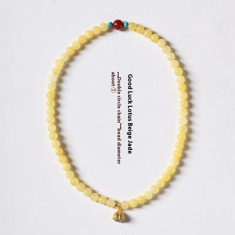 Handmade double ring bracelet for women with yellow jade and topaz stones in a retro design.
